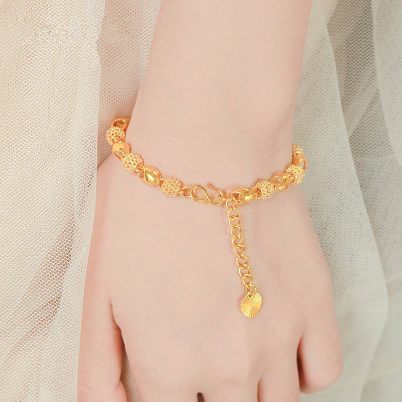 Hollow and exquisite female Passepartout bracelet Thailand sand gold wedding bracelet brass gold wedding props jewelry